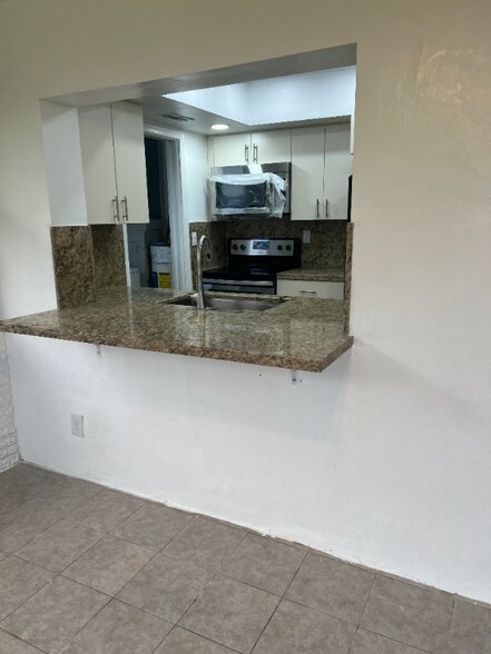 Building Photo - 8409 NW 59th Ct