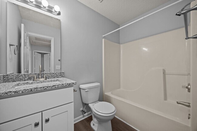 Building Photo - Spacious 3 Bedroom Home, LVP Floors, Updated Kitchen, New Cabinets, Granite, SS Appliances, Pet F...