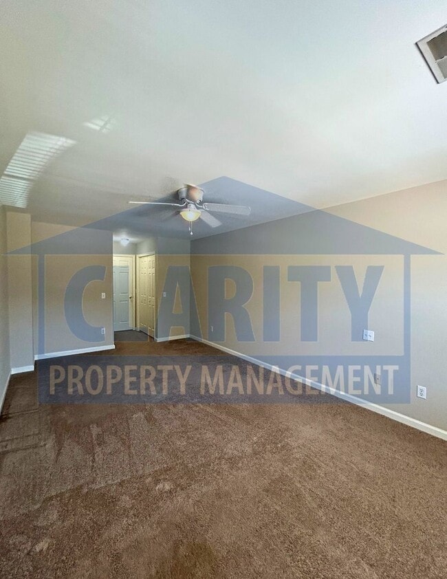 Building Photo - 3-bedroom condo w/ attached garage!