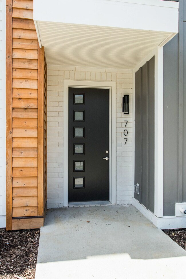 Front Door with frosted windows to allow for natural light and privacy - 707 Vernon Ave