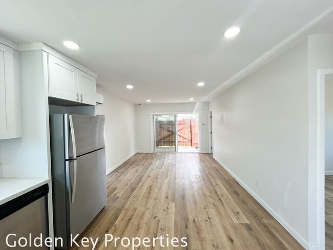 Building Photo - Welcome to your beautifully renovated sing...