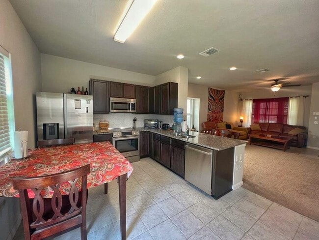 Building Photo - 9504 Morning Iris Dr