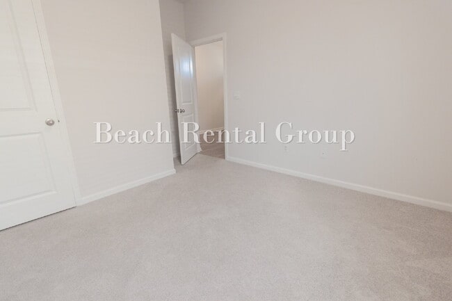 Building Photo - Spacious 4 Bedroom with Pond View