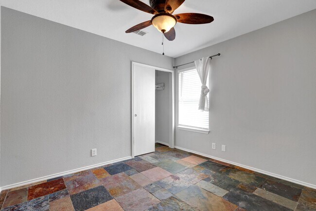 Building Photo - Carpet-Free Home with High Ceilings & Outdoor Retreat
