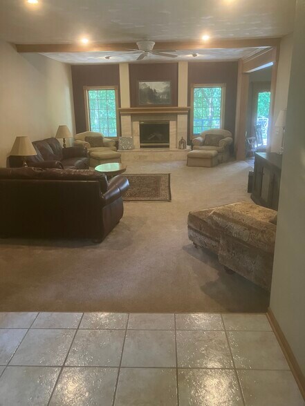 Step down living room from entrance - 180 Nature Valley Pl NW
