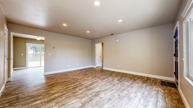 Building Photo - Bright 2 Bedroom, 1 Bathroom Single Family Home! Attached 2 Car Garage and Landscaping Included!