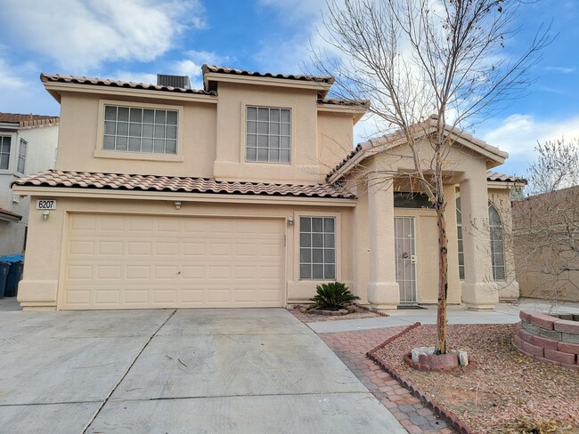 Building Photo - 6207 American Beauty Ave