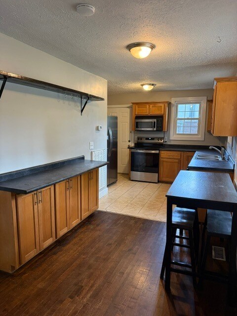 Building Photo - Two Bedroom, Two Bath home with large back yard and attached garage!