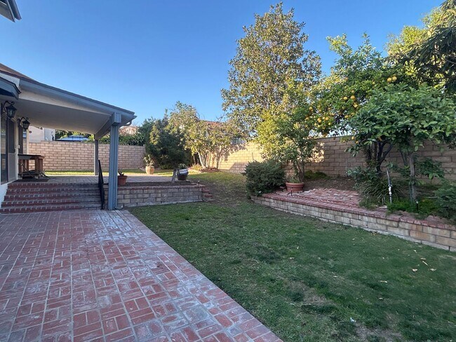 Building Photo - Rare opportunity to lease a 4-bedroom home featuring oversized bedrooms, scenic hilltop city view...