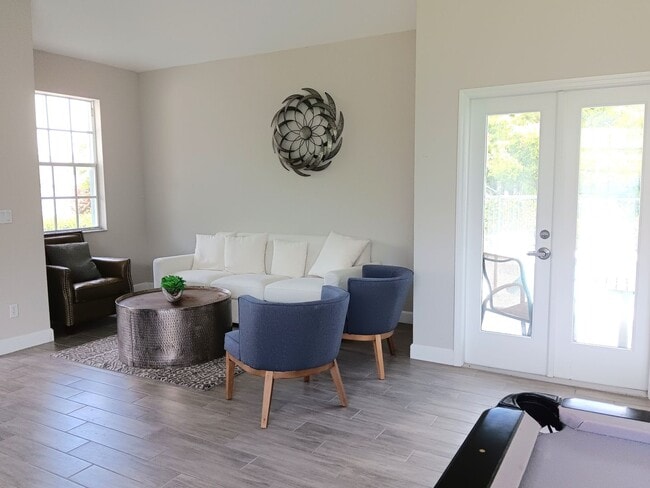 Building Photo - Stunning townhome in gated community near ...