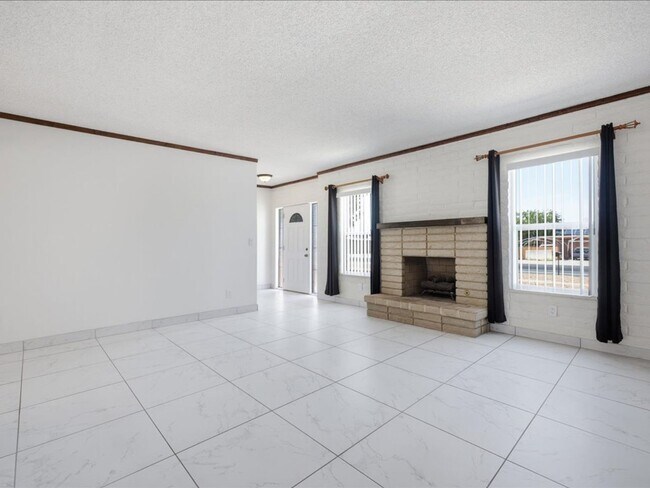 Building Photo - Concept Living with Large Enclosed Backyard & Modern Upgrades!