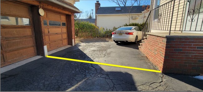 Parking within the yellow line - 0/26 Bellair Ave