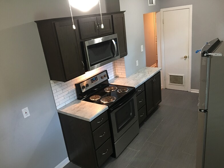 Stove-side cabinets - 230 Middlebury Dr.