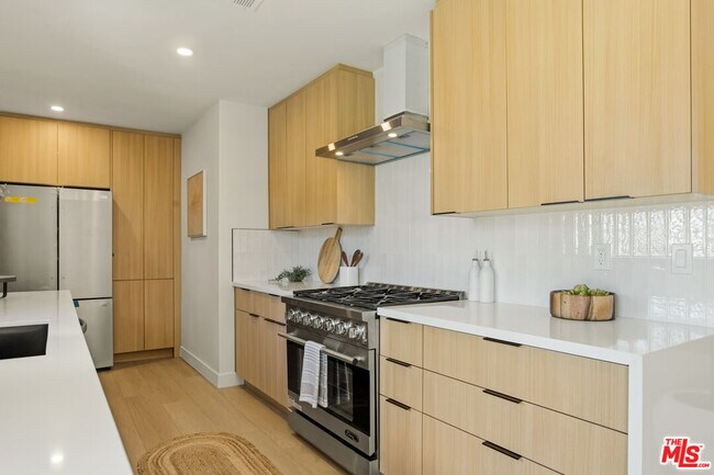 Building Photo - 7358 Paso Robles Ave