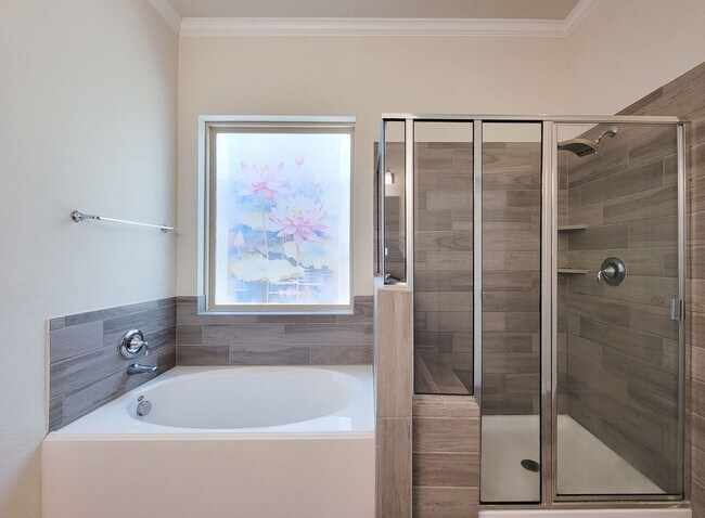 Building Photo - This thoughtfully designed home boasts 4 spacious bedrooms (2 down) and 3.5 baths, providing ampl...
