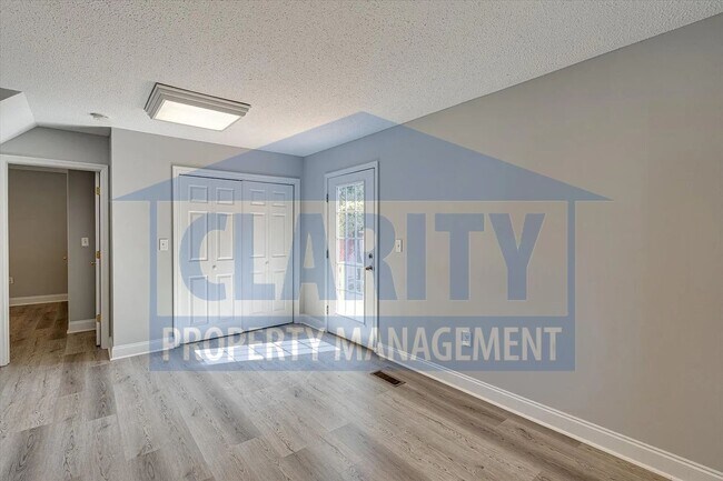 Building Photo - Updated house with carport and shed on corner lot!