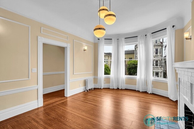 Building Photo - Pacific Heights: Remodeled Bi-Level Condo w/ Private Yard & Garage near Alta Vista Park