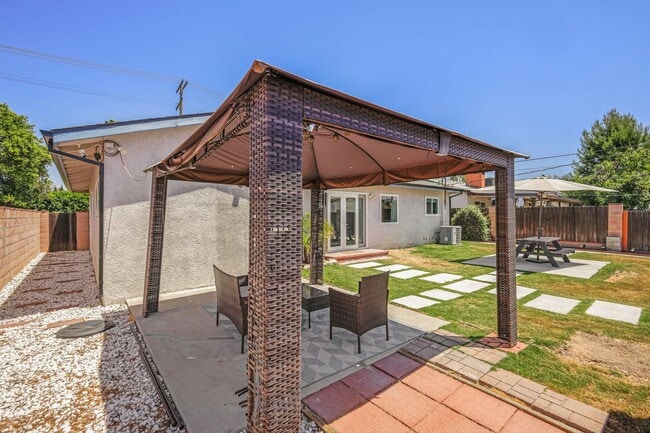 Building Photo - Stylishly Remodeled 4-Bedroom Home in Prim...