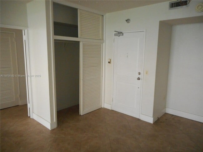 Building Photo - 10185 Collins Ave