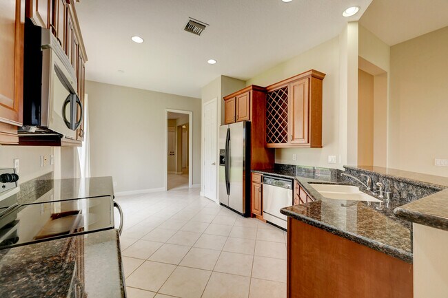 Building Photo - 8908 Champions Way