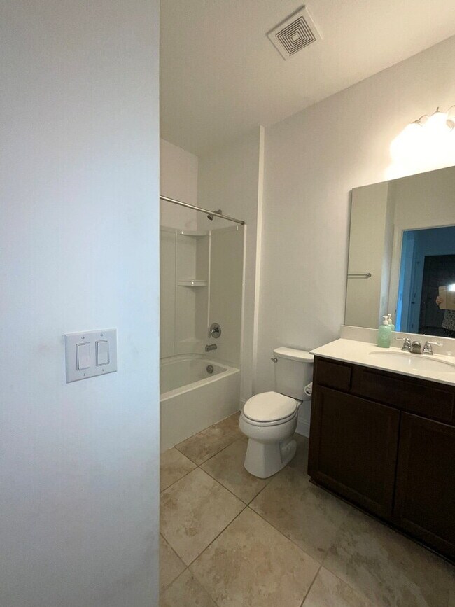 Building Photo - "Spacious 4-Bed Oasis with Stunning Lake V...