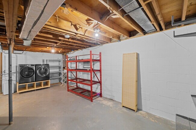 Building Photo - Completely Renovated Corner Townhome with Modern Kitchen, Designer Baths, and Private Yard