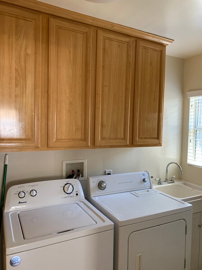 Service Room with many Storage Cabinets - 8260 Willoughby Ave