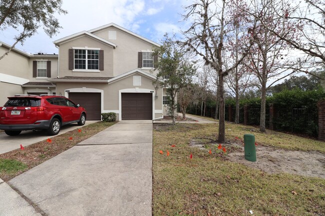 Building Photo - Town home 2 story, 3/2.5/1 backing up to T...