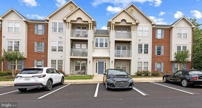 Building Photo - Welcome to Piney Orchard! This beautifully updated 2-bedroom, 2-bath condominium!