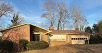 Building Photo - 2 bedroom 3 bath  Mid- Century style home! This home has a wonderful outdoor area great for Enter...