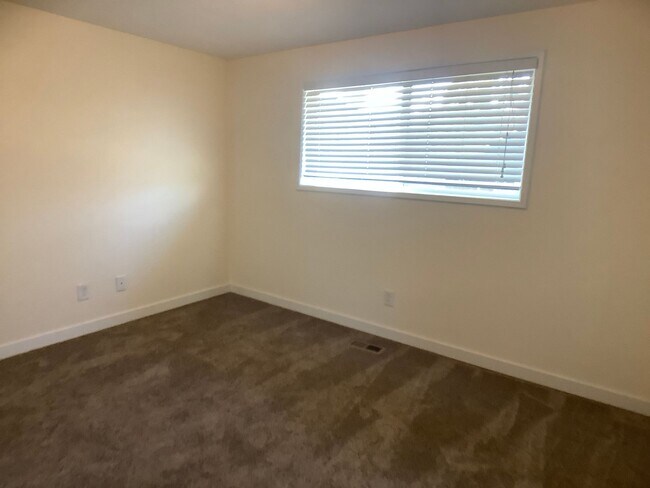 Building Photo - Three bedroom home with large yard| Available July!