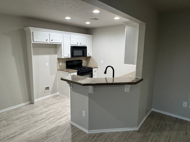 Building Photo - Storm Shelter!!! This 3 bed, 2 bath, 2 Car Garage home has new paint, kitchen and bathroom granit...