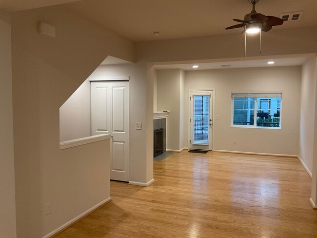 Building Photo - Riverfront Townhome with Tandem Garage & Fenced Yard