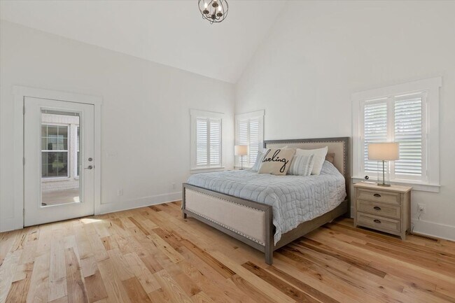 Building Photo - unning custom-built home on a full acre in...