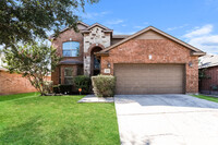 Building Photo - Impressive Brick Home in Little Elm, TX