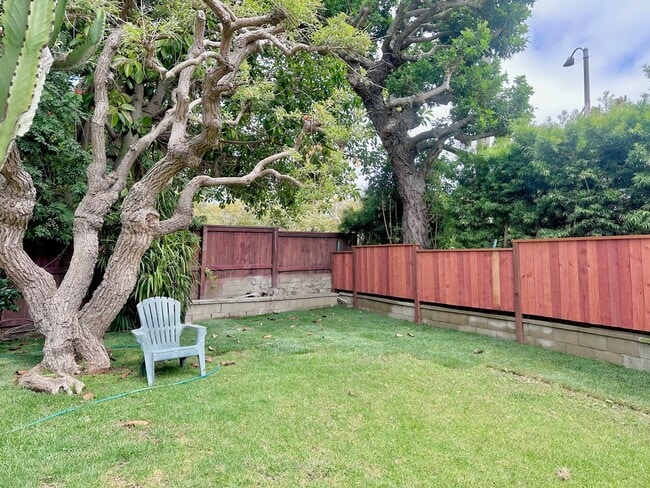 Building Photo - Meticulously Restored 1920s Craftsman on a Private, Hedged Lot | Pet Friendly!