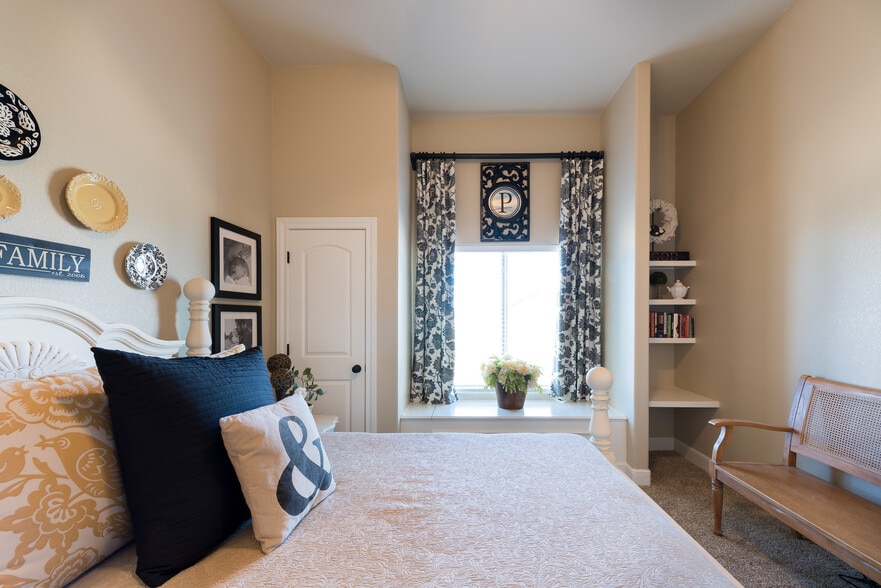 Front bedroom provides charm with a built in window seat and shelving! Window seat provides storage for large items or linens! - 249 Springfield