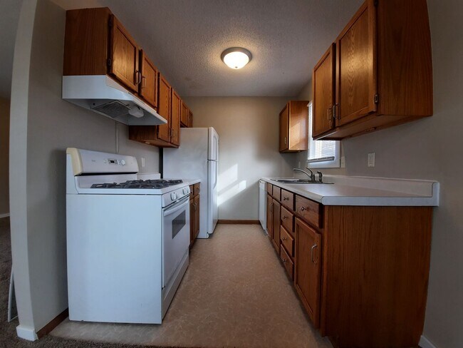 Building Photo - Pet Friendly, no weight/breed restrictions! Detached Garage!