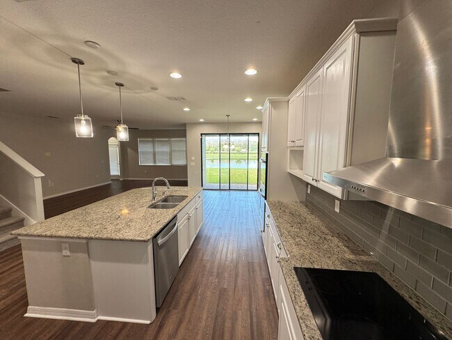 Building Photo - $300 off of a month of rent!! Experience the Epitome of Lakeside Luxury Living — For Rent in Narc...