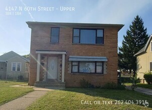 Building Photo - Spacious Partially Rehabbed 3 Bedroom Uppe...