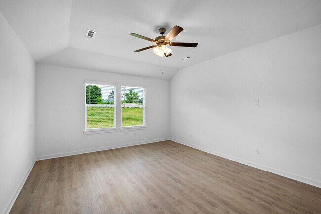 Building Photo - Stunning New 4-Bedroom Home with Modern Up...