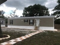 Building Photo - Two-bedroom Home with Water, Garbage, and Lawncare Included