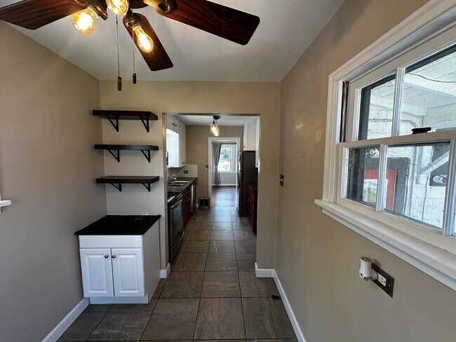 Building Photo - Charming 3-Bed Retreat with Finished Basement an Hardwood Floors!