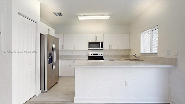 Building Photo - 388 NW 12th Pl