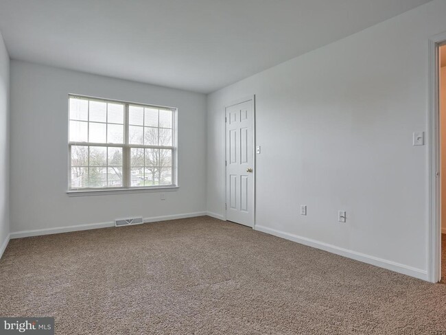 Master bedroom with walk in closet - 64 Tia Circle