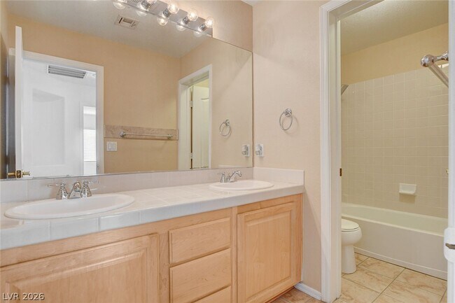 Building Photo - 8401 Desert Quail Dr