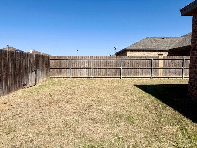 Building Photo - Elevated Finishes, Unbeatable Backyard, and a Location That Delivers