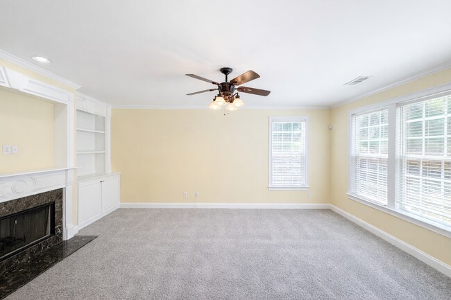 Building Photo - Clean 5 Bedroom Collins Hill Home with First Floor Suite and Oversized Master