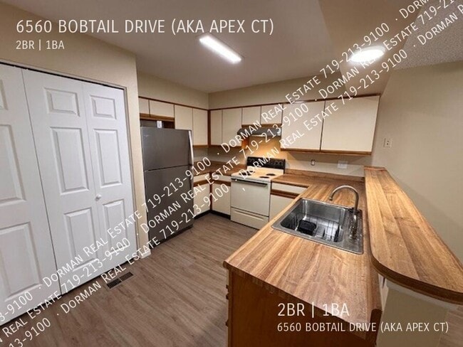 Building Photo - 6560 Bobtail Dr