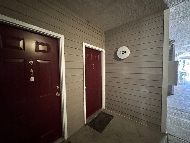 Building Photo - Home Near UNR: Spacious 4BR/4BA with Gated Access and Balcony!